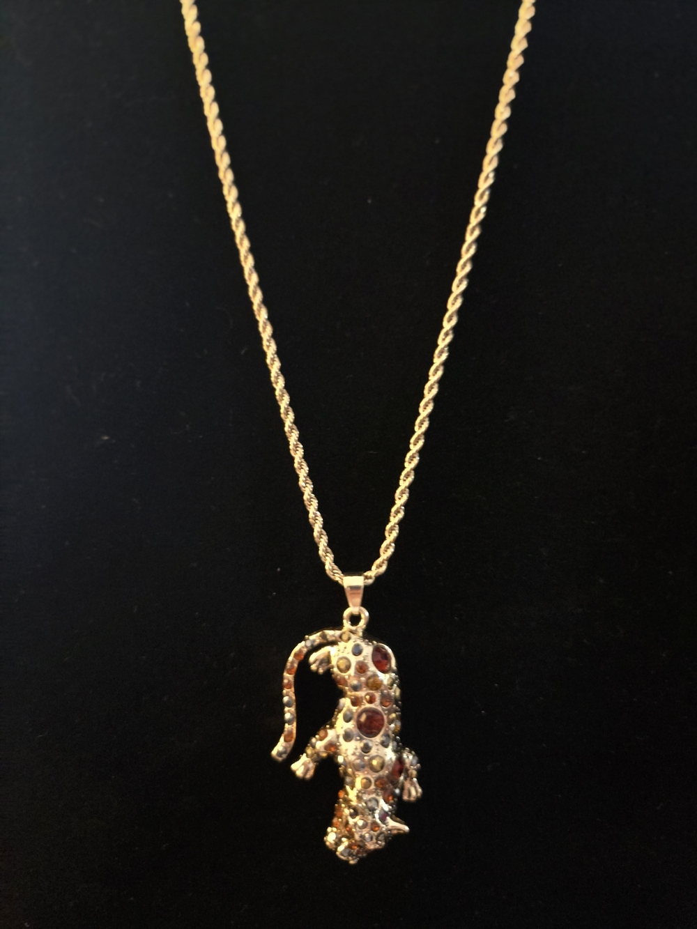 Gold Tone Leopard Pendant Necklace with Red and Amber Stones